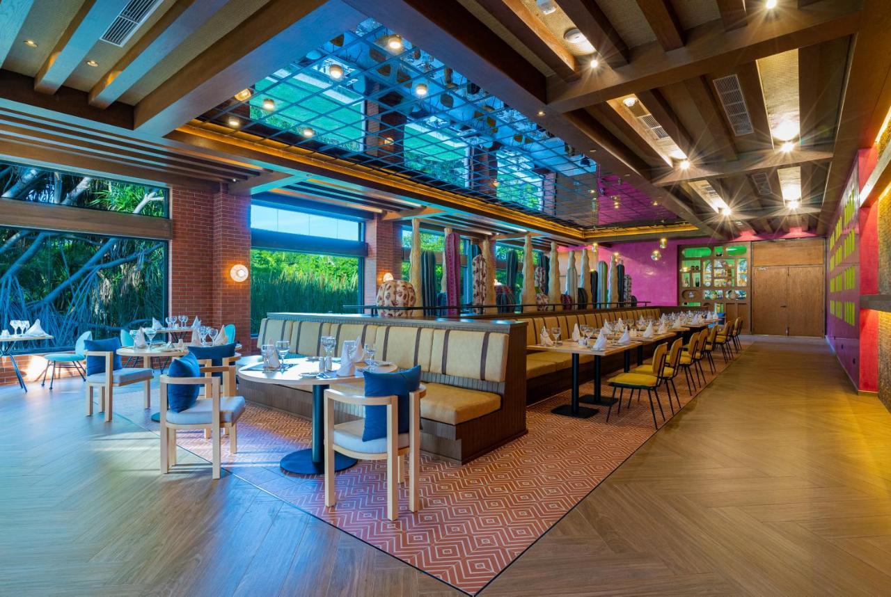 Caribe Deluxe Princess Punta Cana Bagian luar foto The interior of the restaurant